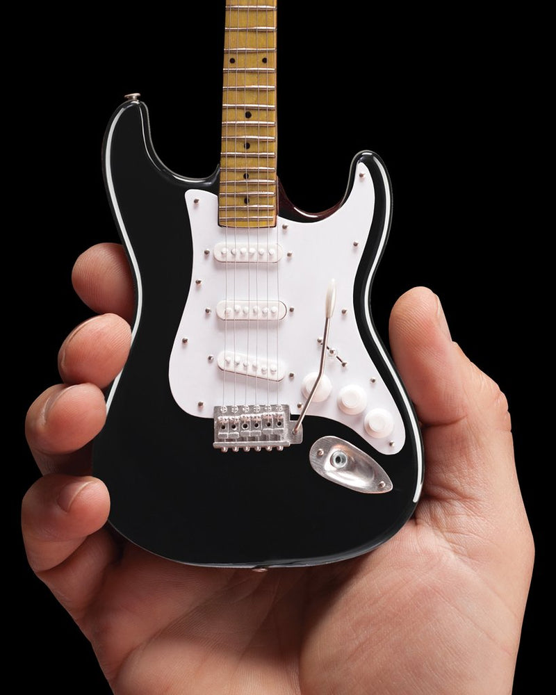 Fender™ Strat™ Classic Black Miniature AXE Guitar Replica - Officially Licensed Collectible (FS-002) in hand
