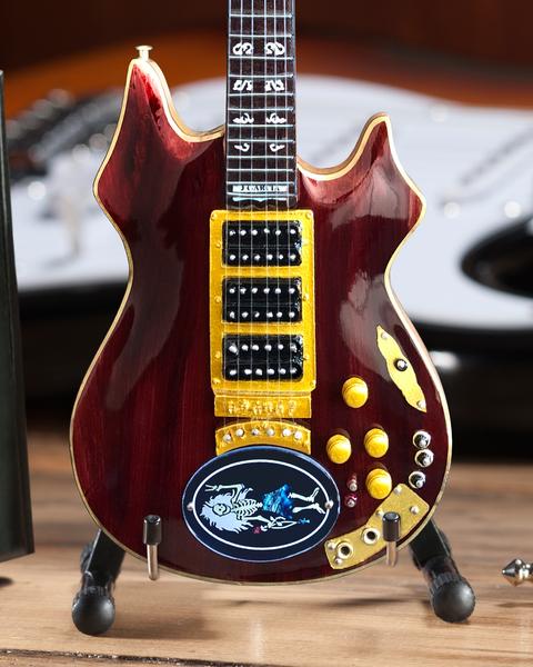 Jerry Garcia™ Miniature Rosebud Tribute Mini Guitar Replica - Officially Licensed Collectible (JG-149) on desk