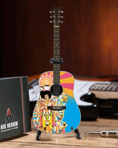 Jimi Hendrix Miniature AXIS Bold As Love Mini Acoustic Guitar Replica Collectible - Officially Licensed (JH-803) on the desk