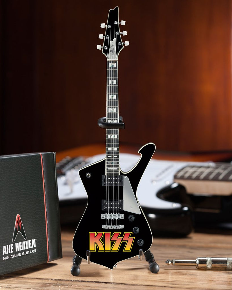 KISS Logo Paul Stanley Miniature Guitar Replica - Officially Licensed Collectible (2M-K01-5008) on desk