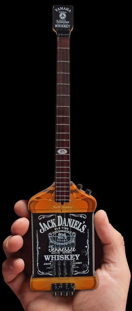 Officially Licensed Michael Anthony Jack Daniel’s Bass Mini Guitar Replica Collectible (MA-030) in hand
