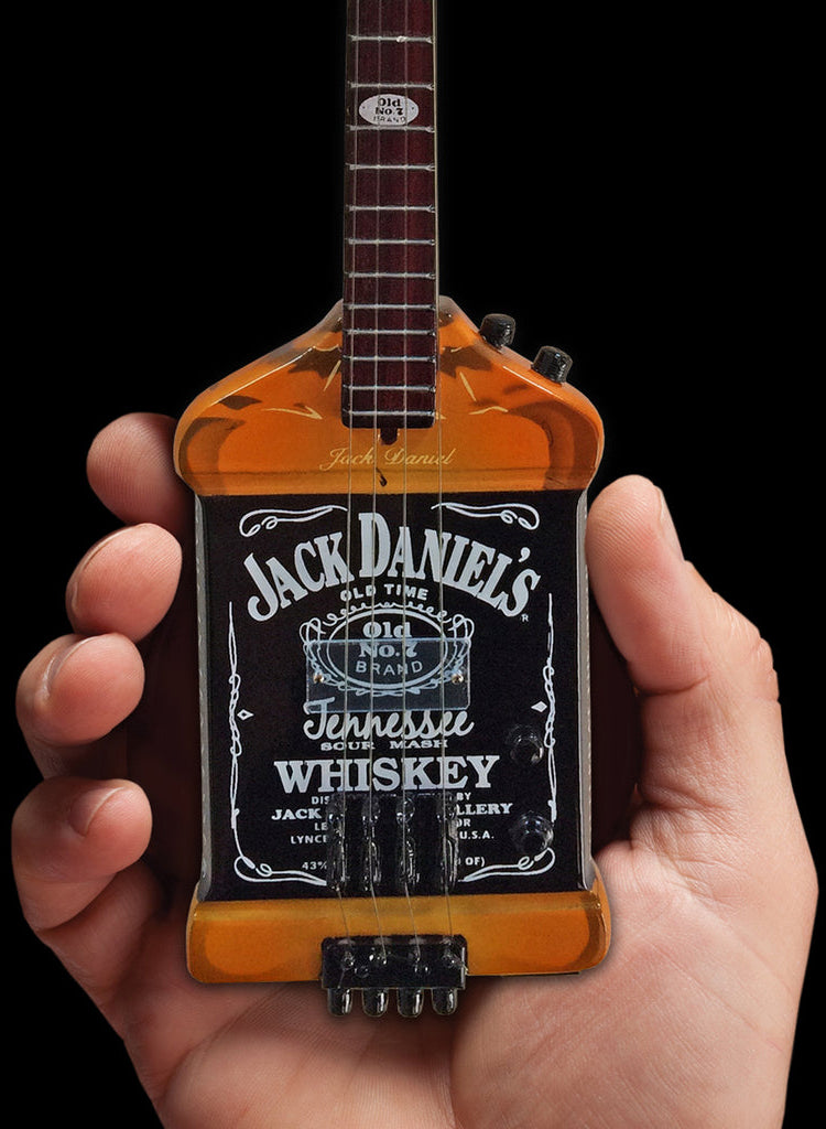 Officially Licensed Michael Anthony Jack Daniel’s Bass Mini Guitar Replica Collectible (MA-030) in palm