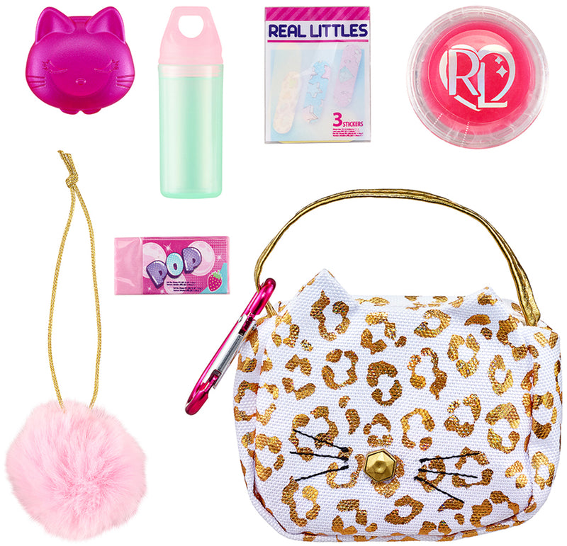 REAL LITTLES Unicorn Travel Pack with Toy Suitcase, Carry Bag,  Unicorn Journal and 15 Surprise Toy Accessories Inside -  Exclusive