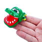 World’s Smallest Crocodile Dentist - in hand