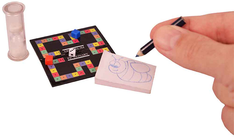 World's Smallest Pictionary in hand