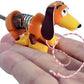 World Smallest Slinky Dog in palm