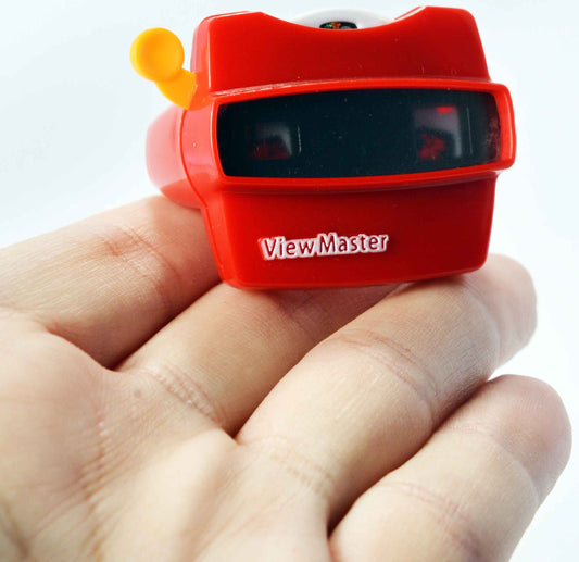 World's Smallest Fisher Price Viewmaster in hand