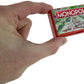World’s Smallest Monopoly in hand