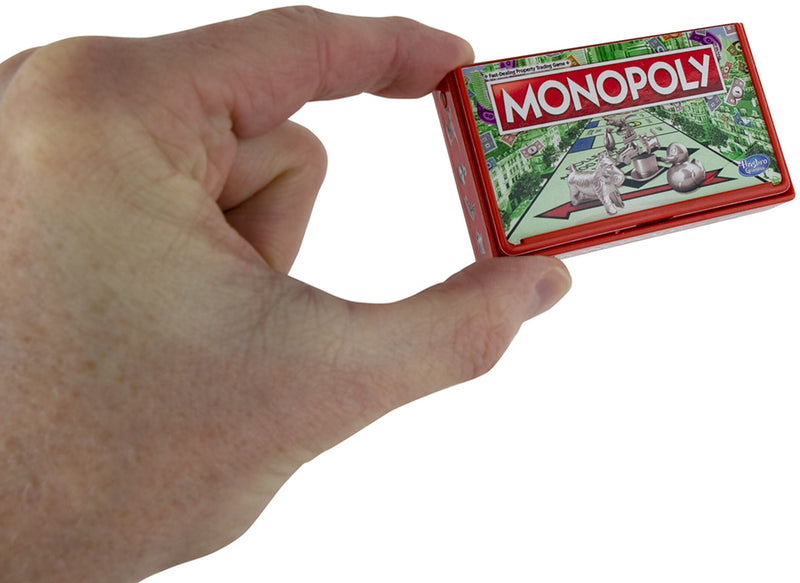 World’s Smallest Monopoly in hand