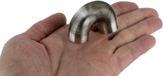 World’s Smallest Slinky in hand
