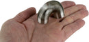 World’s Smallest Slinky in hand
