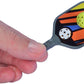 World’s Smallest Pickleball in hand