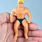 World’s Smallest Stretch Armstrong in hand