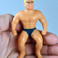 World’s Smallest Stretch Armstrong in palm