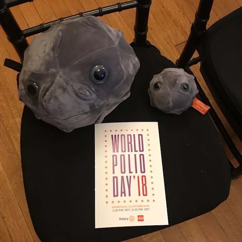 Giant Microbes Plush - Polio - Poliovirus 0n the chair